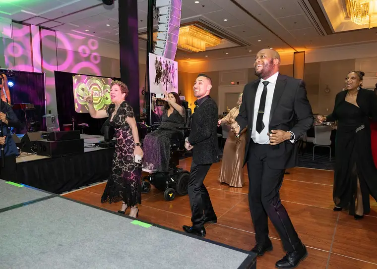 Rising Together Benefit attendees